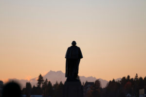 Silhouette of George Washington statue, University of Washington, Seattle campus on November 20th, 2013. Photo by Katherine B. Turner